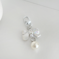 Iridescent Coquette Bow Keyring by Coconut Lane with a pearl and metal clasp on a white background.
