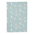 A blue cotton tea towel with a pattern of seagulls in various poses.