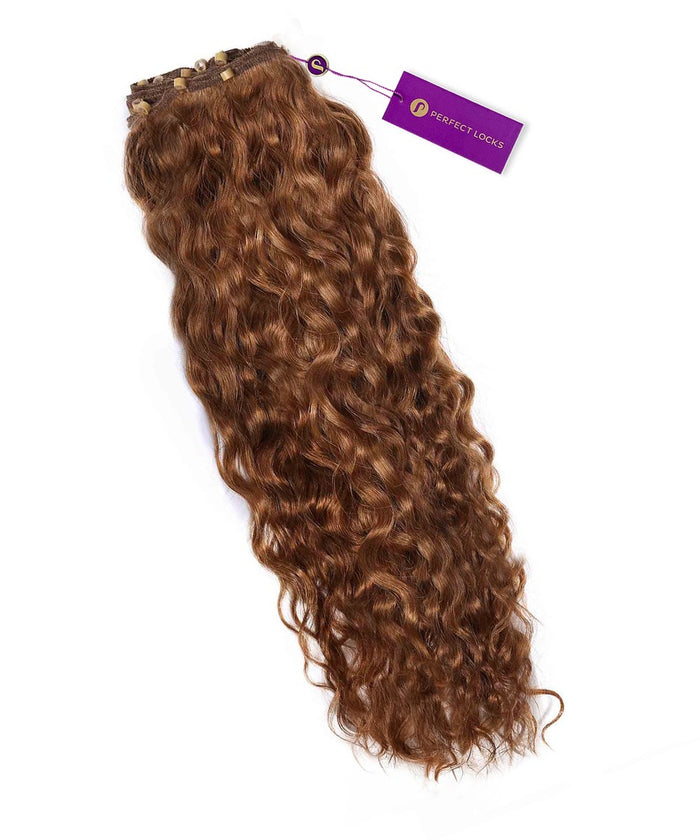 A bundle of platinum blonde  Curly Beaded Weft Rows by Perfect Locks, defined curls, purple brand tag, neatly arranged.#color_golden-brown-(6)