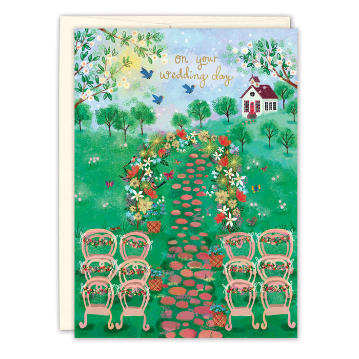 Wedding card with a colorful illustration of a garden path and chairs, featuring the text 'On your wedding day'.