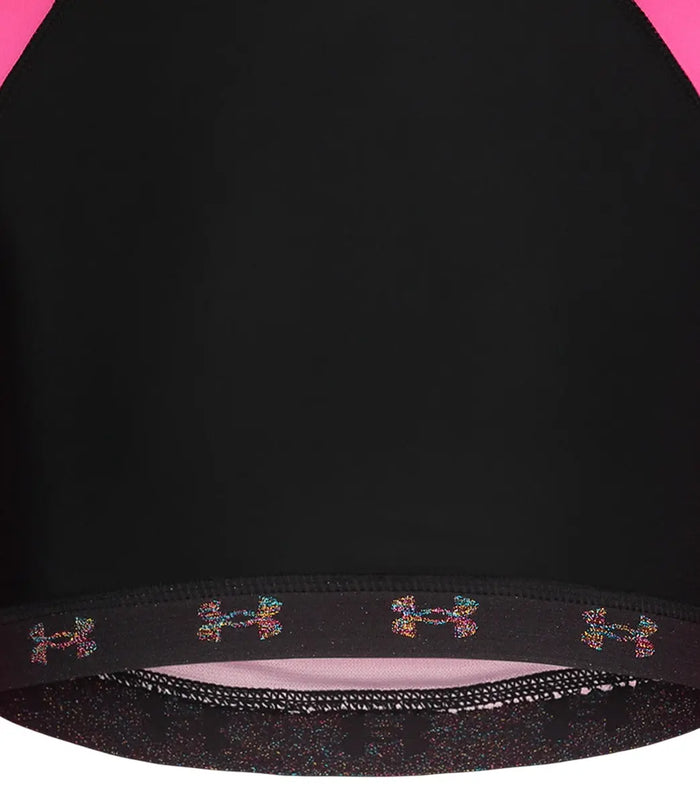 Close-up of Under Armour Pink/Black swim set fabric and logo waistband