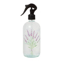 Clear glass spray bottle with black nozzle and lavender design on a white background