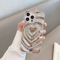 Liquid Chrome 3D HeartWave Case For iPhone — With its eye-catching raised heart design and sleek finish, this case is as protective as it is stylish.
