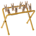 Yellow clothespin rack with wooden pegs on a white background
