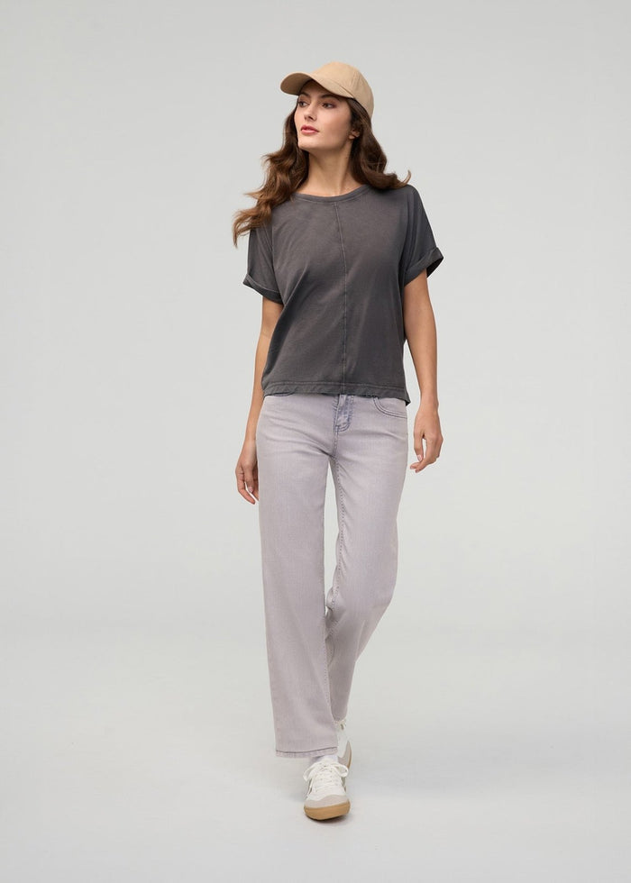 Light-wash mid-rise straight denim jeans with a subtle fade, styled with a dark gray t-shirt.