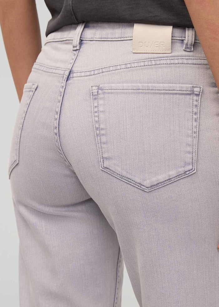 Light purple denim jeans with straight leg, mid-rise waist, and visible back pocket stitching.