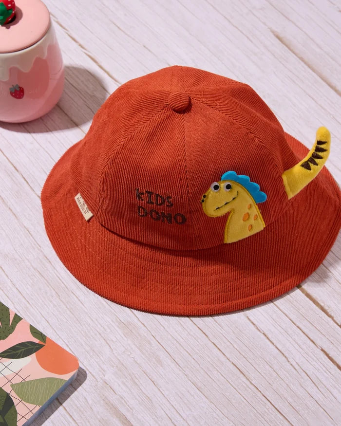 Orange kids bucket hat with dinosaur patch, wide brim.