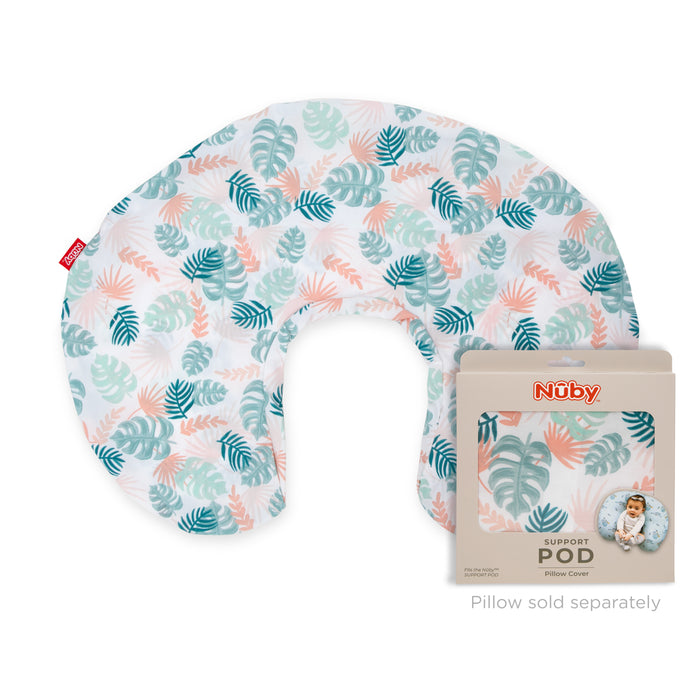 Support Pod Pillow Cover with a green, blue, and peach leaf pattern shown beside its packaging. This machine washable cover fits the Support Pod Pillow, sold separately, for easy infant feeding.