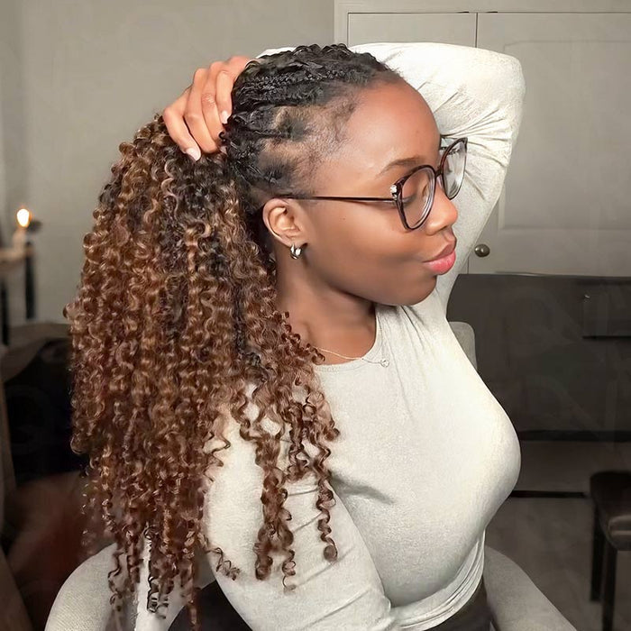 Model showcasing QVR #T1B/30 water wave crochet hair extensions styled in a chic braided look with curls.