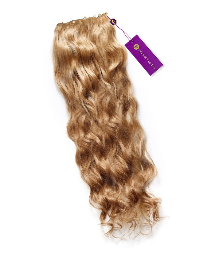 A bundle of long, wavy, dark auburn Perfect Locks Wavy Beaded Weft Rows with a purple tag, displayed on white.#color_honey-blonde-(27)